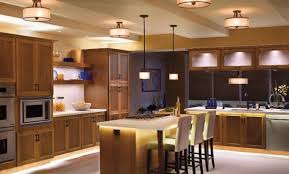 This kitchen is lit with recessed lighting that is arranged in an asymmetrical pattern on the kitchen ceiling. 7 Money Saving Hacks You Can Employ To Remodel Your Kitchen With A Small Budget Increation Inte Kitchen Ceiling Lights Kitchen Lighting Design Kitchen Design