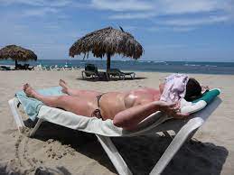 File:Female topless on the beach.jpg - Wikimedia Commons