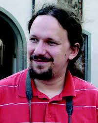 On the origin of ionicity in ionic liquids. Ion pairing versus charge  transfer