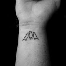 Three Birds On A Wire Tattoo I Like These Little Birds Little Bird Tattoos Birds Tattoo Bird Tattoo Wrist