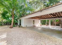 A tarpaulin or shade sail carport is a large piece of waterproof canvas or polyester material. 12 Clever Carport Ideas That Go Above And Beyond Extra Parking Space Bob Vila
