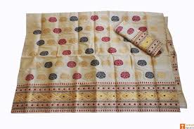 This is a traditional wedding collection with artistic chumki work.the set is outlined with naksi. Attractive Toss Muga Silk Mekhela Chadar From Assam 678 Mekhel
