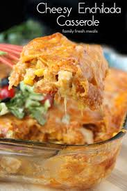 This layered chicken enchilada casserole is ready in just 35 minutes, a snap to make, super yummy and kid friendly. Cheesy Chicken Enchilada Casserole Family Fresh Meals