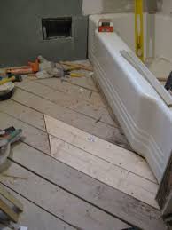 Hanging Cement Board Drywall Fixing The Subfloor Cleaning Wood Home Repairs Young House Love