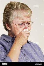 Thelma Soares, mother of Lori Hacking, weeps while family spokesman reads a  letter written by Soares concerning the death of her daughter during a news  conference Monday, Aug. 2, 2004, at the