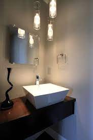 Modern floating vanity powder room. Modern Powder Bathroom With Floating Cabinet Vessel Sink Modern Powder Room Bathroom Inspiration Decor Simple Bathroom Rustic Modern Bathroom