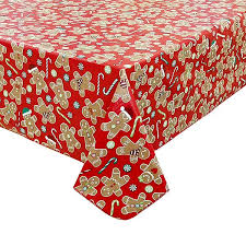 Give your kitchen or dining room a fresh, bountiful new look with this fruit harvest vinyl elasticized table cover. St Nicholas Square Gingerbread Vinyl Tablecloth