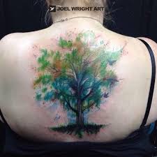 The fluidity and the enhancement of colors in a watercolor style greatly illustrates the life and grandeur of a tree design. Watercolor Tattoo Watercolor Tattoo Of A Tree Tattoos Watercolor Tattoo Tree Tattoo