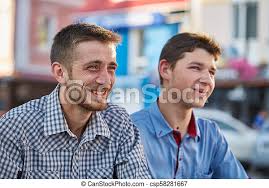 Woman playing on a mobile phone. Two Friends Hanging Out Outside In The City On The Retro Background Post Soviet Architecture Carefree Time With Best Canstock