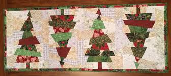 Are you looking for affordable longarm quilting machines? Crazy Christmas Tree Pattern By Karla Alexander Pieced And Sit Down Machine Quilted By Wendy John Modern Christmas Quilt Christmas Tree Quilt Christmas Quilts