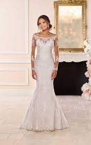 This dress has no shortage of lace or elegance when you see it from the front, but it will really wow with the open back and chapel train. Lace Wedding Dresses Romantic Lace Gowns Essense Of Australia