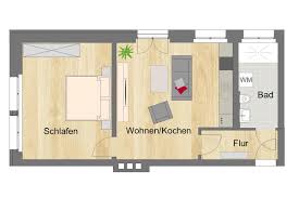 Wohnbereich mit schlafsofas für 2 personen, voll ausgestattete küche, ein schlafzimmer für 2. Barrierearm Wohnen Marienthal Wewobau Eg Zwickau