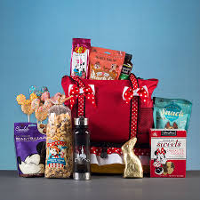 Featuring a small polar bear and her family, god gave us easter delves into the story of jesus and how he died and rose again. Put A Spring In Your Step With New Easter Baskets From Disney Floral Gifts Disney Parks Blog