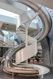 In the interest of time i had a friend use his machine which has a large bed cut out some of the stair case is 16 and ¾ steps tall and is built around a 3 schedule 40 steel pipe. A Two Story Gym In Beijing That Comes Complete With A Slide Architecture Design Competitions Aggregator