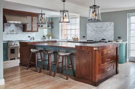 Here, the dark tone of the natural wood island provides contrast to the soft grayness of the room. Grey Kitchen Wall Ideas And Photos Houzz