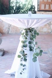 * always make sure to order the correct size linens! Eucalyptus Cocktail Table Ties Are Such A Lovely Element To Add Whim Florals Wedding Cocktail Tables Wedding Centerpieces Wedding Table