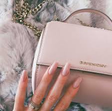 The extensions, often claw like in shape, are designed by filing the natural nail to the bed and painting acrylic over the top. Acrylic Nails Fake Nails Kylie Jenner And Long Nails Image 3499797 On Favim Com