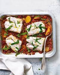 Herby Cod And New Potato Traybake Recipe Delicious Magazine Recipe Fish Recipes Healthy Cod Fillet Recipes Cod Recipes Healthy