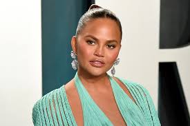 It's a series of meaningful numbers. Chrissy Teigen Shows Off New Hand Tattoos