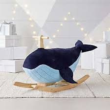 A paperweight, side table decor, and shelf accent—this acrylic whale decor figurine is both decorative and functional. Whale Nursery Decor Crate And Barrel