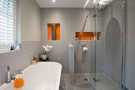 The room also has its own bathroom. Orange And Gray Bathroom Ideas Houzz