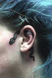Frauentattoos Auf Den Ohren Tattoos Face Tattoos Snake Tattoo