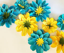 One way to celebrate spring is to make may baskets and fill them with flowers. April Showers Bring May S Paper Flowers Tinselbox