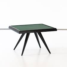 It lets you create a warm and inviting look with your favorite decor, collectibles. Italian Modern Green Leather Black Wood Coffee Table 1950s 89930