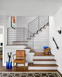 Florida homeowner kelly simmons gave her home a modern farmhouse twist with sleek metal railings. Farmhouse Staircase By Clayton Little Architects Love The Railings And Wood Color Staircase Decor Stair Railing Design Modern Stairs