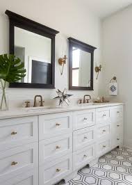 I'm going to show you how to frame a large bathroom mirror and how to update decorative mirror with scrap wood. Black Wood Frame Mirrors With White Dual Washstand Transitional Bathroom