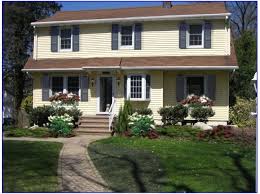 Yellow Shutters Brown Roof Blue Green Grey Shutters Exterior Paint Colors For House Brown Roofs Green Shutters