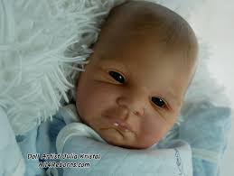 Look how cute a cuddle baby can be 😍 This is Jessie. This baby doll is so  realistic with his painted hair and he took