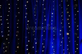 Check out our blue fairy lights selection for the very best in unique or custom, handmade pieces from our craft supplies & tools shops. Long Exposure Of String Fairy Lights On Blue Illuminated Curtain Stock Photo Image Of Dark Independence 137367218