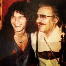 Hi Rebecca. Eddie with his father Jan van Halen who played o the first Van  Halen record .....flute
