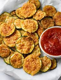 How to make the air fryer zucchini chips wash zucchini and cut into thin slices, about ¼ inch in width. Air Fryer Zucchini Chips Easy Healthy Recipes
