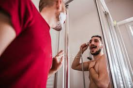 I love the look of stacked white towels in a bathroom and i didn't want all of them hidden in the linen closet. Gay Couple Having Fun In Bathroom Together Family Mixed Race Stock Photo 266493538