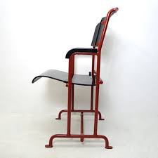 That's why we carry a variety of chairs in different styles and various materials — including plastic patio chairs, wood patio chairs, metal patio chairs and wicker patio chairs — to suit. Modernist Red Metal Black Wood Folding Armchair By Gerrit Rietveld For Hopmi For Sale At Pamono