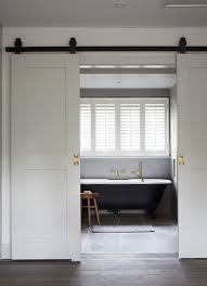 Wood panelling can add texture to a small space, making it feel extra cosy. Ensuite Ideas 17 Clever Ideas For An Ensuite Bathroom Livingetc