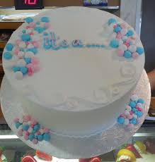 Planning a baby shower for someone you love can be both fun and incredibly stressful. Calumet Bakery Gender Reveal Cake With Pearls And Scrolling Gender Reveal Cake Cake Shower Cakes