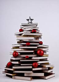 A Cute Christmas Decorating Idea For Small Spaces Pile Up Your Favorite Books And Make It Festive Wit Book Christmas Tree Christmas Books Christmas Traditions
