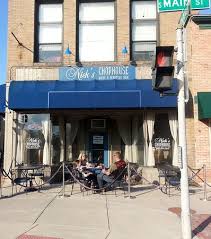 Outdoor Seating Front Of Entrance To Nicks Chophouse