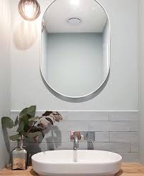 Small Space Big Details Love This Powder Room From Blackburnbathroomskitchens Using Our Masia Gris Claro Powder Room Small Powder Room Round Mirror Bathroom