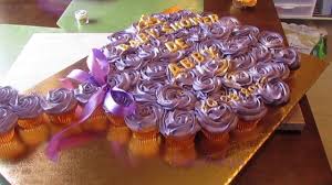 Baby rattle cupcakes are an easy and sweet ending for a baby shower! Pull Apart Rattle Cupcake Cake Diy Cuteness