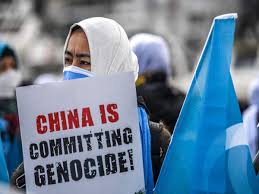 The murder of a whole group of people, especially a whole nation, race, or religious group: Uighur Muslim News Rape Internment Camps Mass Sterilisation How China Is Committing Genocide Of Uyghurs World News Times Of India