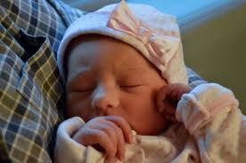 I'm officially a Mimi! Aubrielle Elizabeth Hunter made her way into the  world, weighing 7lb 4 oz, and measuring 20" long. Our son and his wife  Hannah are blissfully happy, and Mimi