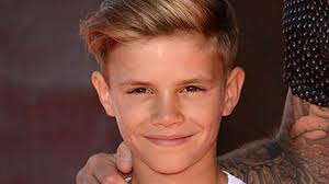 Romeo Beckham is now a godfather