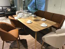 Kitchen tables with bench seating made of wood can be in formal and informal styles. Versatile Dining Table Configurations With Bench Seating