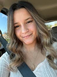 Can someone edit the car seat buckle out of this picture of my daughter?