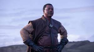 The Mandalorian Every Character Cameo In Season 1 And Upcoming Character In Season 2 Ign Star Wars Celebration Carl Weathers Mandalorian