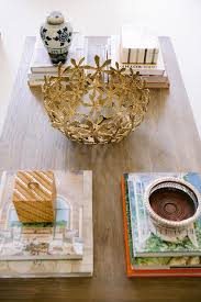 Coffee tables for sale, clear. Gold Flower Bowl On Brown Oak Coffee Table Transitional Living Room